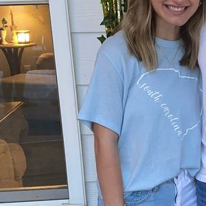 Blue “South Carolina” t shirt.